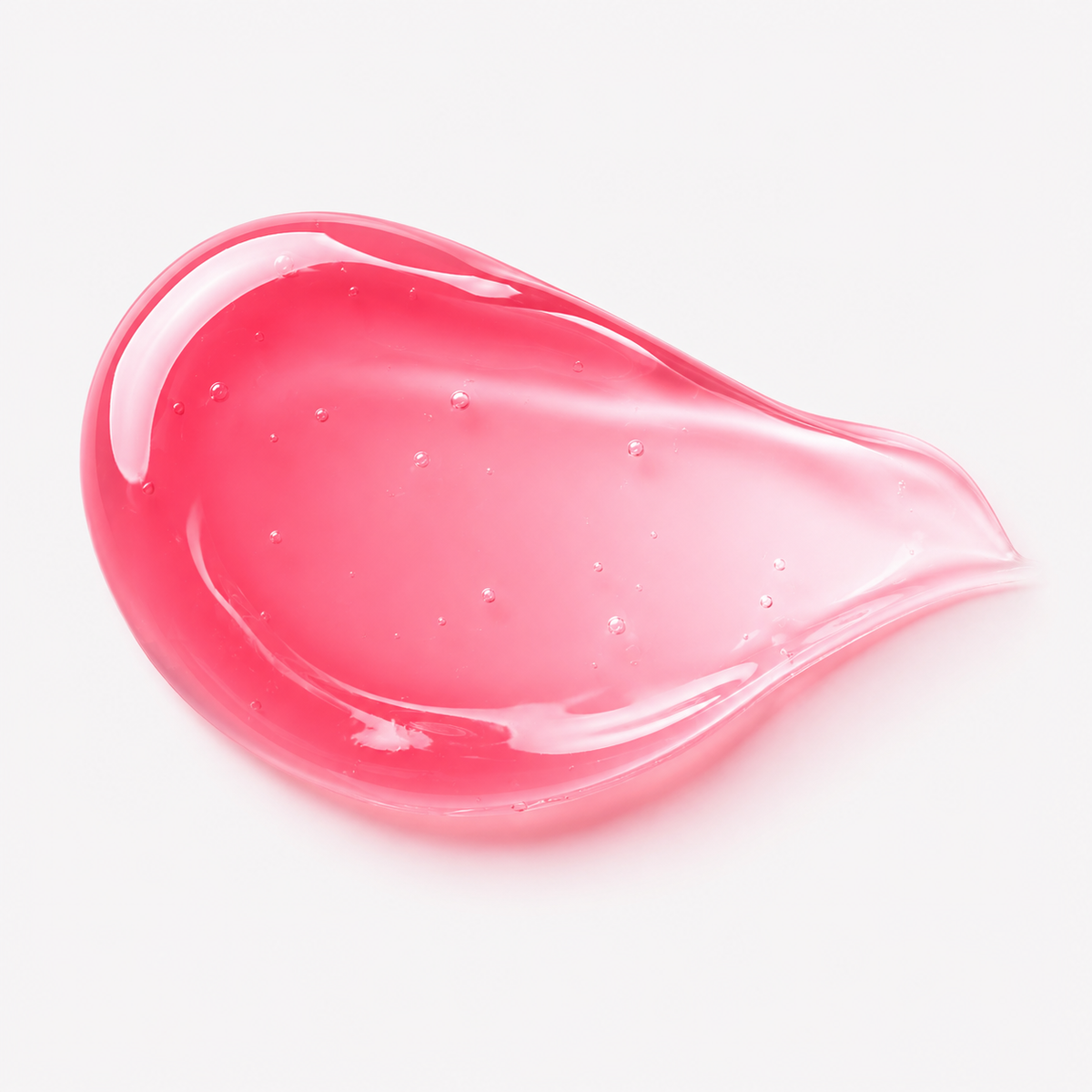Yellow Rose Hyaluronic Lip Balm med glansig rosa textur mot ljusrosa bakgrund